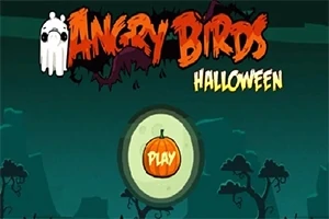 Menu s nápisem v oranžových a žlutých tónech s motivem Halloweenu a tlačítkem Play ve tvaru dýně na tmavém pozadí se siluetami stromů