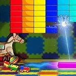 Barevné bloky jsou uspořádány nahoře s míčem odrážejícím se od podložky směrem k nim