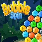Barevné bubliny uspořádané do kruhu s výraznou žlutou hvězdou uprostřed a nápisem Bubble Spin na modro-žlutém pozadí džungle