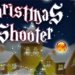 Vánoční motiv s textem Christmas Shooter, třpytivými ozdobami a zimní krajinou na pozadí