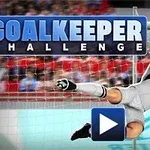 Brankář v šedém dresu chytající míč před brankou s nápisem GOALKEEPER CHALLENGE v horní části