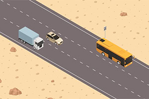 Na obrázku je silnice vedoucí pouští, po které jedou nákladní auto, osobní vůz a žlutý autobus