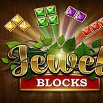 Nápis Jewel Blocks s listy a barevnými drahokamy v různých tvarech na tmavém pozadí