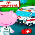 Růžový hroch oblečený jako lékař stojící před nemocnicí s ambulancí a lékařským kufříkem