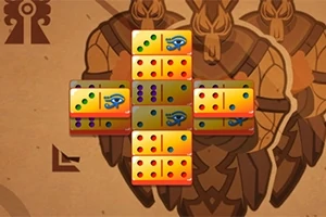 Barevná domino v křížovém uspořádání na pozadí s egyptskými motivy