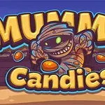 Mumie s cukrovinkami a nápisem Mummy Candies na pozadí s hieroglyfy