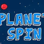 Nápis PLANET SPIN na tmavě modrém pozadí s hvězdami a dvěma pixelovanými planetami