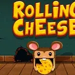 Myš držící sýr stojí před zdí s nápisem ROLLING CHEESE