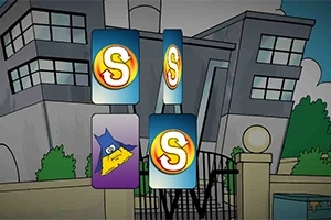 Karty s logem S a jedna s fialovým Batmanovým symbolem před moderní budovou a plotem