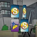 Karty s logem S a jedna s fialovým Batmanovým symbolem před moderní budovou a plotem