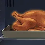 Pečené kuře v pekáči uvnitř trouby